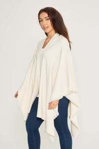 FRINGED EDGE KNITTED CAPE